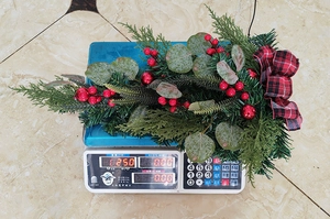 Weight measurement of Eucalyptus Christmas teardrop swag with berries and plaid bow