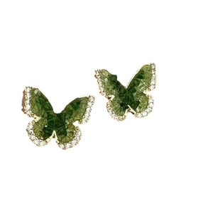 Blue crystal butterfly stud earrings with gold plating and sparkling white accents