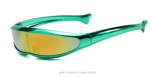 Detail of metallic green frame with fish-tail temple tips on futuristic Y2K sunglasses