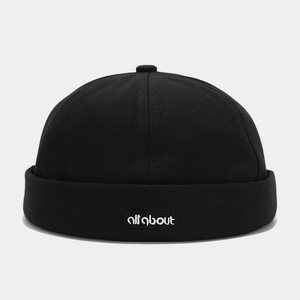 Detailed close-up of cotton canvas docker hat with all about embroidery patch