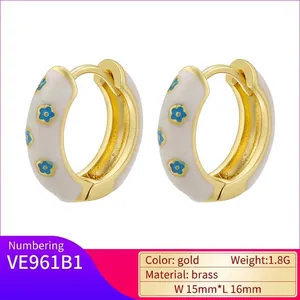 Sweet colorful enamel flower hoop earrings in 18K gold plated brass with white and blue patterns
