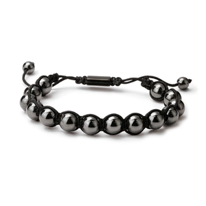 Handmade woven bracelet with natural tiger eye and hematite beads on a white background