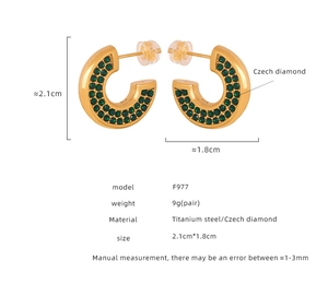 Detail view of gold titanium C-hoop earrings with inlaid green Czech diamonds and measurements