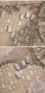 Detail of TL-416 nail stickers featuring white unicorn and dreamcatcher patterns