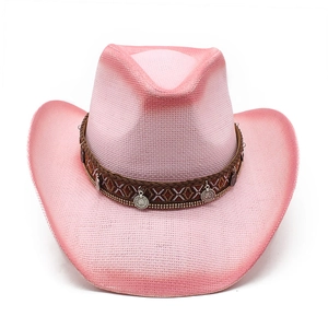 Detail of pink straw cowboy hat featuring woven strap and vintage silver metal coins