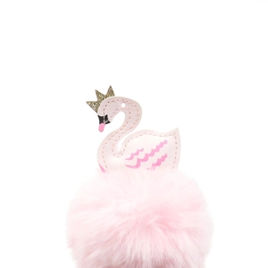 Pink swan plush pompom keychain with golden glitter crown and fluffy faux fur ball