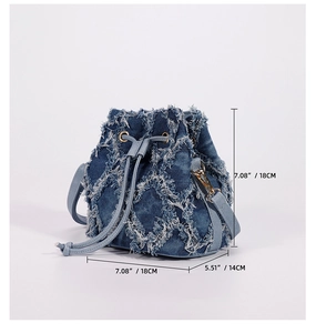 Blue tie-dye denim bucket bag dimensions showing 18cm height and 14cm width with gold hardware