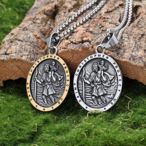 Detailed relief of Saint Christopher on gold and silver stainless steel oval pendants