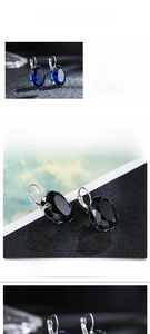Detailed view of pear-cut cubic zirconia earrings with lever-back closure and silver finish