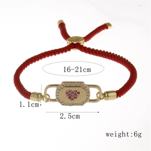 Detail view of heart lock bracelet with red cord, zircon stones and adjustable size