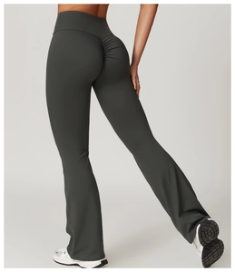 Close-up of high-waist flared yoga pants featuring scrunch butt lifting seam detail
