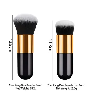 Dual black and gold foundation and powder brushes with fiber bristles and size details