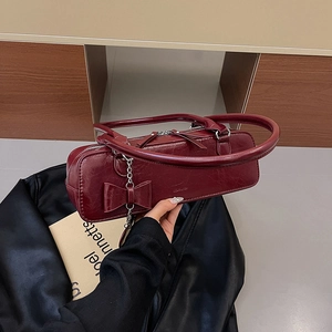 French vintage dark red bowling baguette bag with sleek faux leather and bow detail