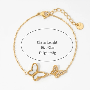 Detail showing gold butterfly pendant with crystals and 16.5+3cm length measurement