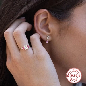 S925 sterling silver jewelry set featuring a gold ring and earrings with pink gemstones