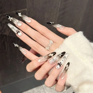 Luxury black and white gradient stiletto press-on nails with butterflies and rhinestones