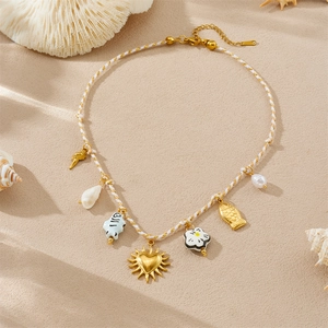Summer ocean style woven necklace with colorful ceramic fish and gold heart charms