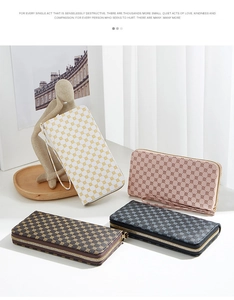 Detail of four colorful checkered long wallets with wristlets in a stylish lifestyle setting