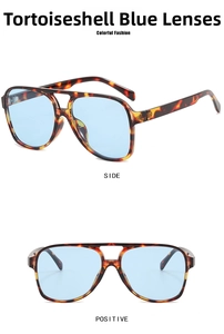 Macro view of vintage double-bridge aviator sunglasses with tortoise frame and blue lenses