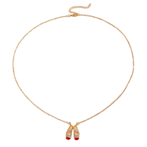 Elegant gold chain necklace with sparkling crystal ballet slipper pendants and red tips
