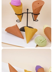Macro view of realistic waffle cone textures and colorful artificial ice cream scoops