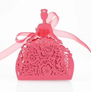 Laser-cut red evening dress favor box with floral hollow patterns and a ribbon tie