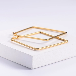 Minimalist square golden stainless steel hoop earrings with polished metallic finish