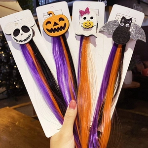 Halloween 4-piece hair clip set with colored wigs featuring pumpkin, bat and ghost motifs