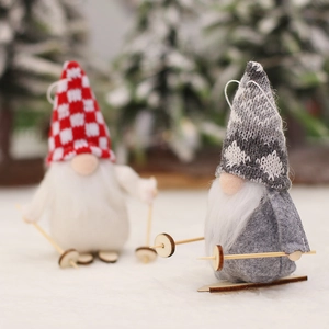 Christmas knitted gnome ornaments with wooden skis for festive tree and holiday decor