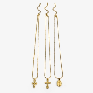 Three gold stainless steel vintage cross pendant necklaces for women in various designs