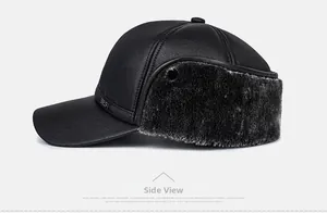 Side view of winter faux leather baseball cap with grey faux fur earflaps and metal detail