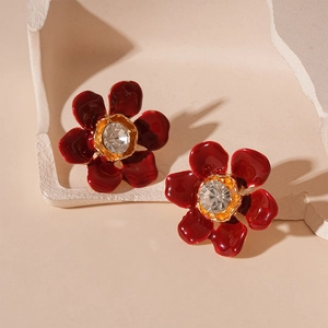 Vintage dark red enamel flower stud earrings with crystal center and gold edges