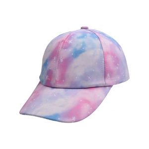 Detailed view of kids baseball cap with vibrant starry sky and cloud print pattern