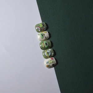 3D relief nail art stickers featuring cute cartoon frogs and rainbow heart patterns