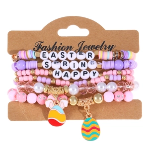 Detail of 5-piece Easter beaded bracelet set with alphabet beads and enamel bunny charms