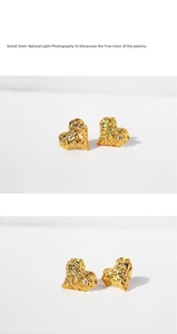 Detail showing gold heart earrings with wrinkled texture and clear zircon stone accents