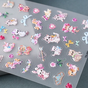 Macro shot of 5D embossed nail art stickers with cute animals and floral textures