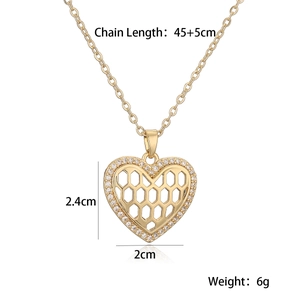 Detail view of 18K gold plated heart pendant with size specs and honeycomb design
