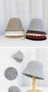 Close-up of knit bucket hat details showing the vintage pattern and wavy brim texture