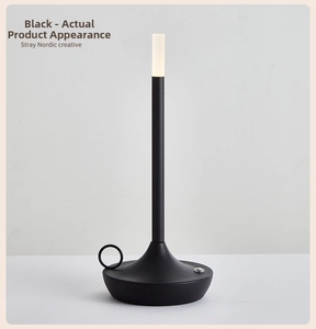 Detail of matte black Nordic LED lantern lamp with charging port and round handle