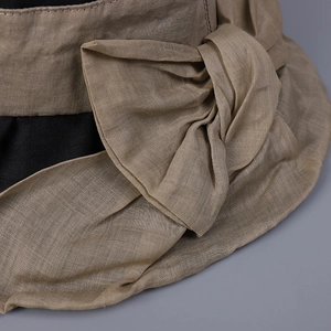 Wide brim ramie sun hat for women featuring an elegant khaki and black bow knot