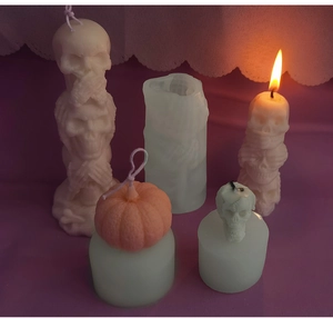 Detailed view of Halloween skull and pumpkin silicone molds with DIY soy wax candles