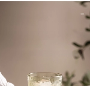 Detail of vintage embossed pattern on high-end glass stemware with thick stable base