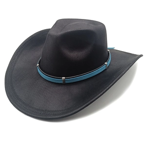 Detail of black western cowboy hat with a light blue suede band and silver buckle