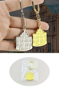 Detail of gold and silver Macau Ruins of St. Paul's 3D relief metal souvenir keychains