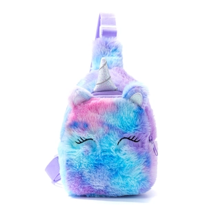 Detail of plush unicorn chest bag showing soft gradient faux fur and silver glitter horn