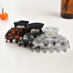 Set of 3 Halloween acrylic hair claws featuring pumpkin, ghost, and spider motifs