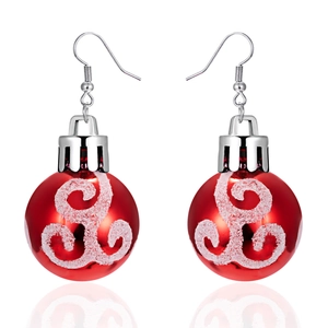Detail of red Christmas bulb earrings with white glitter swirls and silver hooks