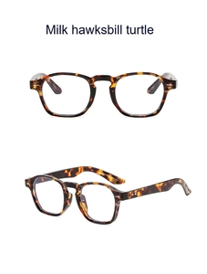 Detail view of round milk hawksbill turtle sunglasses with stylish metal rivets in two angles