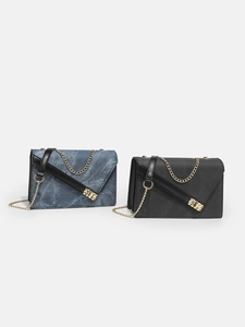 Stylish blue denim and black chain crossbody bags with gold metal hardware and flap design